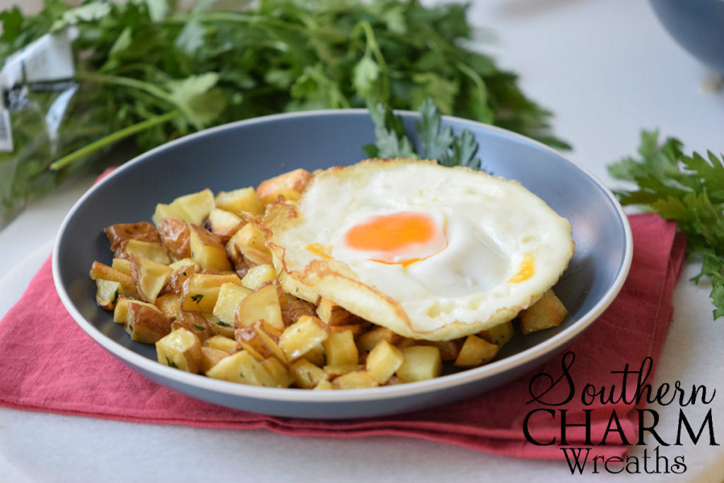 Baked Potato Casserole Recipe for Sunday Brunch served with fried eggs.