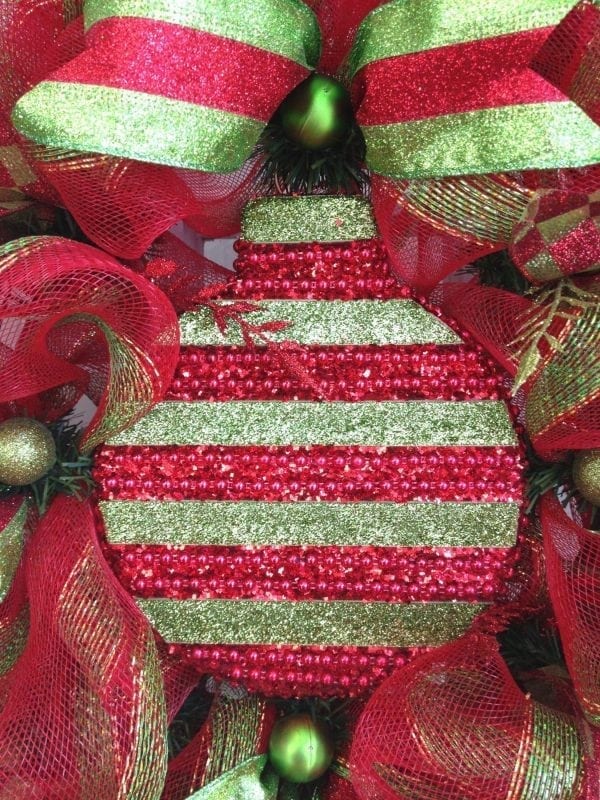 How to attach large ornaments to deco mesh wreaths.