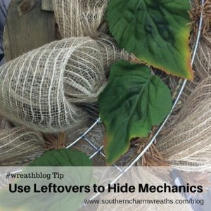 using leftover silk flower wreaths to hide the mechanics on the back of your wreaths.