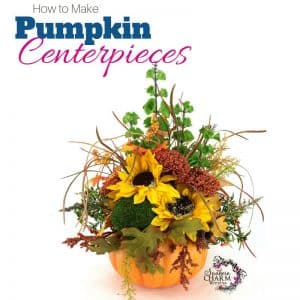 How to make pumpkin centerpieces using lots of fall flowers, pine cones and foam pumpkin by www.southerncharmwreaths.com