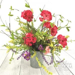 Rustic Spring Centerpiece with galvanized bucket and silk flowers