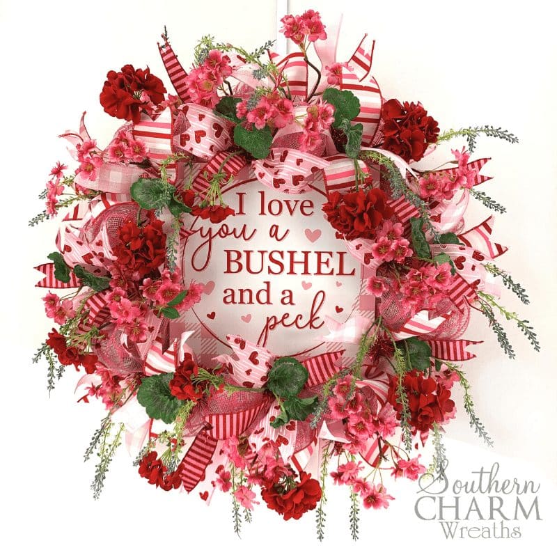 How to make a deco mesh Valentine's Day Wreath using 10 inch mesh, ribbon and silk flowers by Southern Charm Wreath.