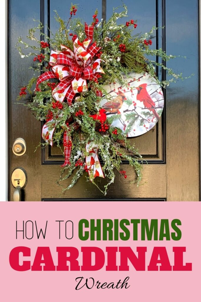 cardinal wreath hanging on a door