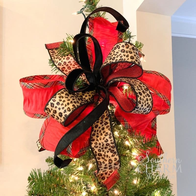 tree topper bow with multiple ribbons
