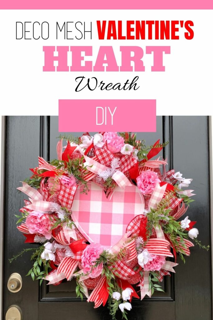 Red, pink, and white deco mesh Valentines day wreath with heart sign on front door