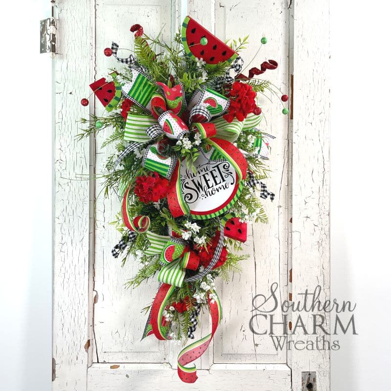 watermelon wreath swag hanging on a door