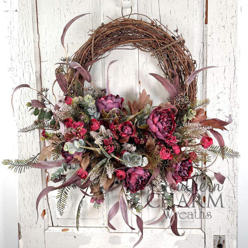 burgundy peony grapevine wreath on white door