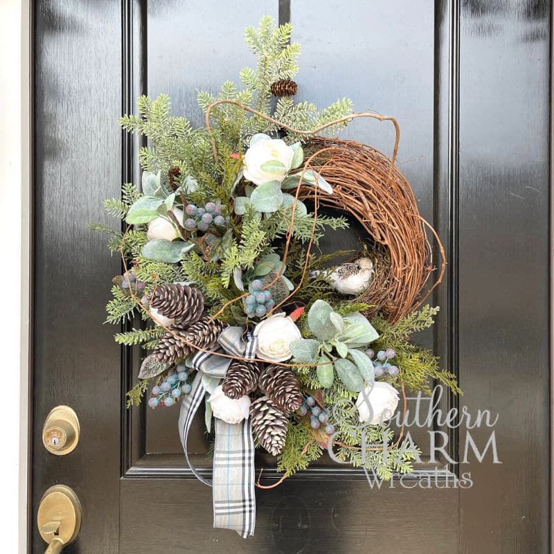 winter rose divided grapevine wreath on black door