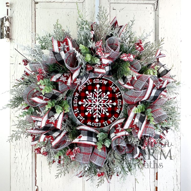 buffalo plaid deco mesh wreath with let it snow sign in center