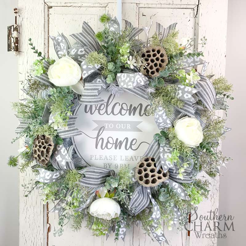 welcome home deco mesh wreath on white door