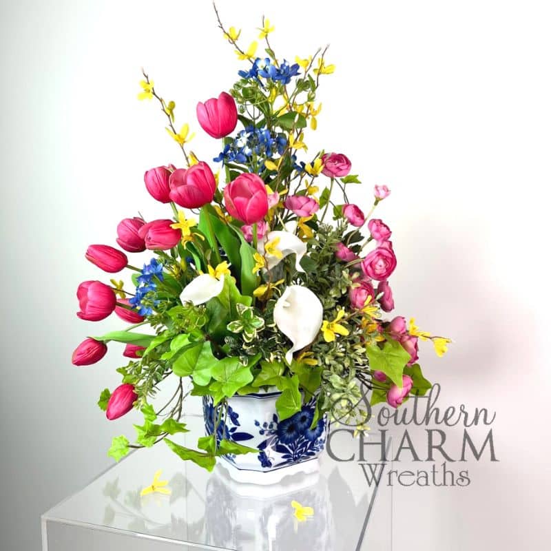 spring tulip arrangement on white background