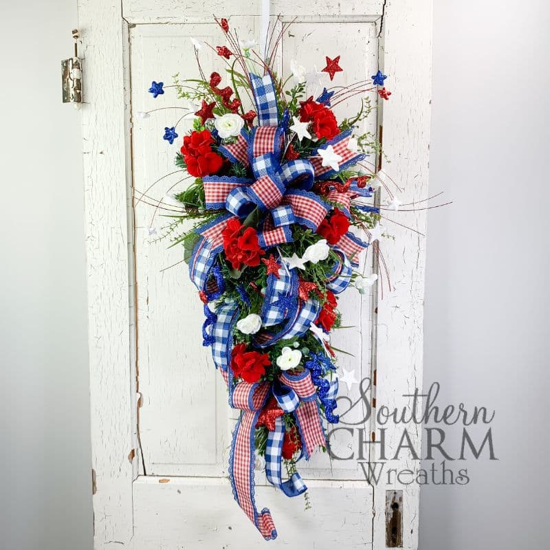 patriotic swag wreath on white door