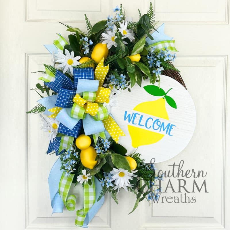 summer lemon daisy wreath on white door
