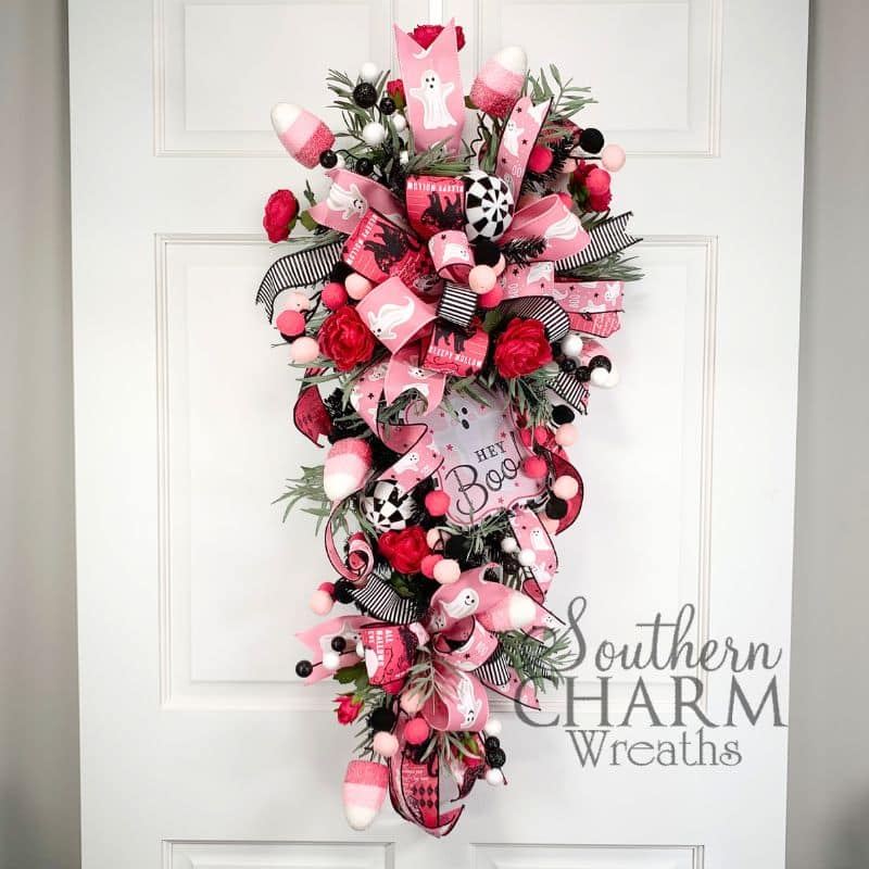 hey boo pink halloween swag wreath on white door