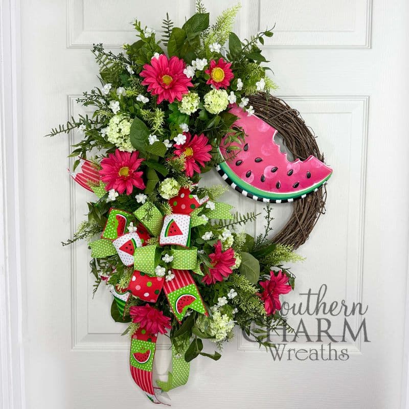 watermelon themed wreath on white door