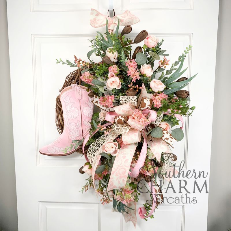 silk flower cowboy grapevine wreath on white door