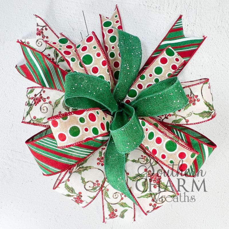 christmas red and green bow on white background