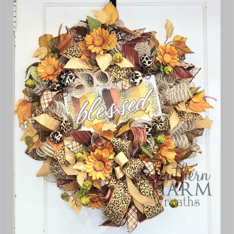 fall blessed deco mesh wreath on white door
