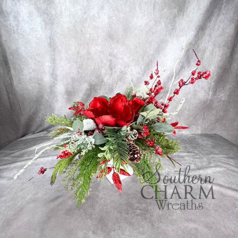 A bold red Christmas floral arrangement.
