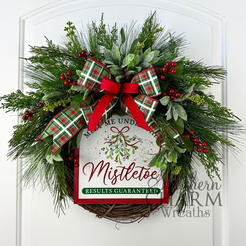 rustic Christmas mistletoe wreath with red and green design