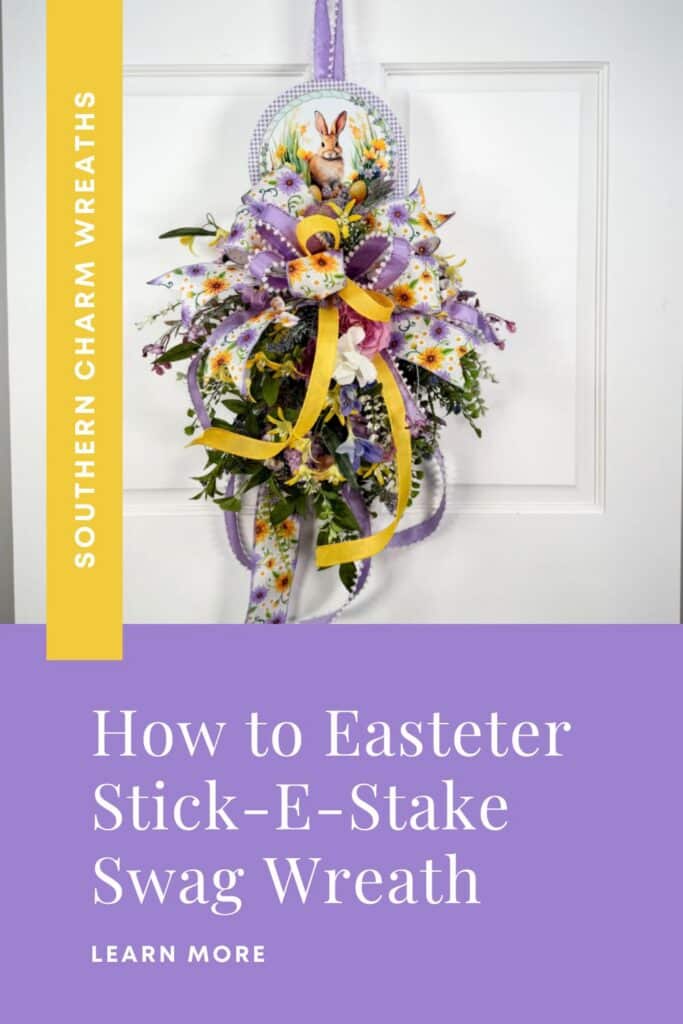 Handmade Easter swag with purple and yellow ribbon, floral accents, and greenery arranged on a vertical door hanger design.