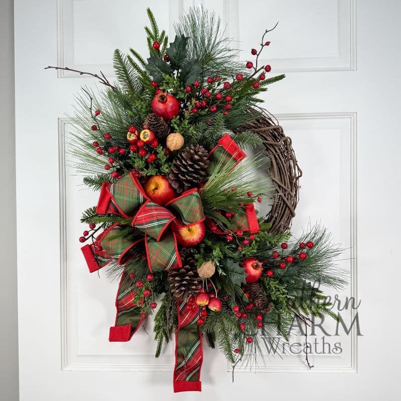 Christmas grapevine wreath on a door.