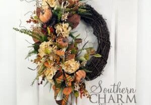 fall hydrangea pumpkin wreath on white door