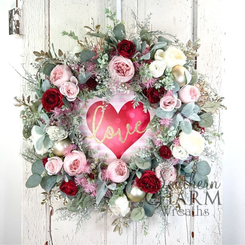 love valentines day evergreen wreath on white door