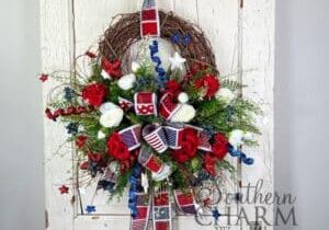 patriotic geranium blueberry wreath on white door