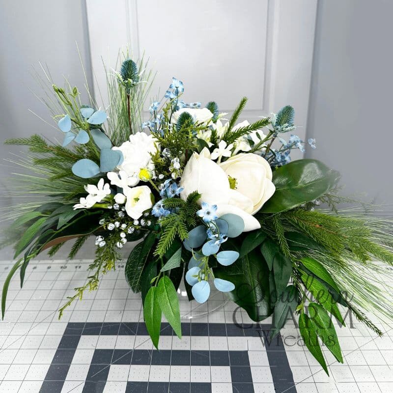 blue and white magnolia arrangement