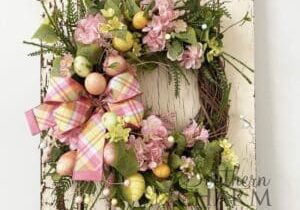 spring easter egg wreath on white door