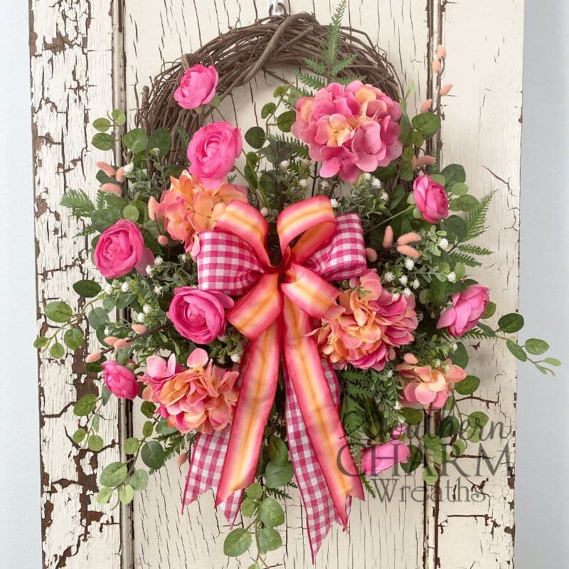 spring hydrangea grapevine wreath on white door