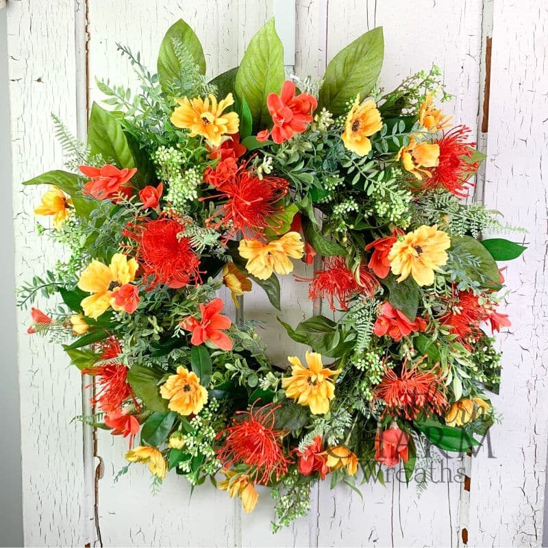 spring summer compact grapevine wreath on white door