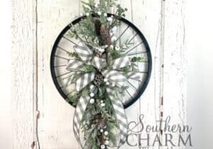 winter bike wheel wreath on white door