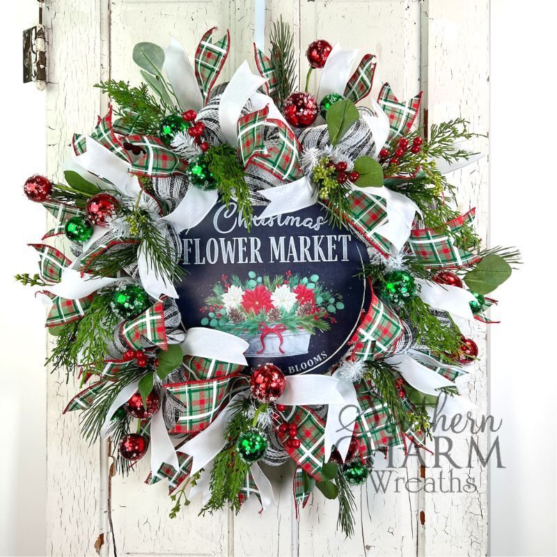 christmas deco mesh wreath on white door