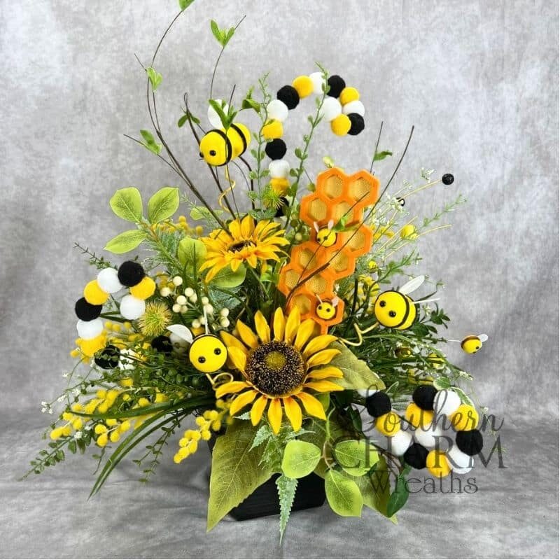 symmetrical bee arrangement on gray background