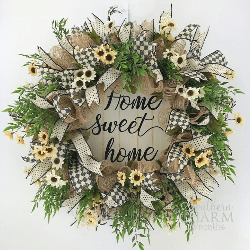Learn how to make a deco mesh farmhouse wreath to use year round.